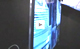 JVC's Edgar Shane shows the new ultra-thin TVs from JVC