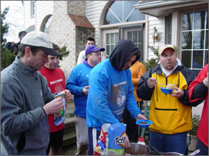 Web Warrior and Brick and Mortar players discuss the game at over chili at the post-2006 Cyber Bowl party